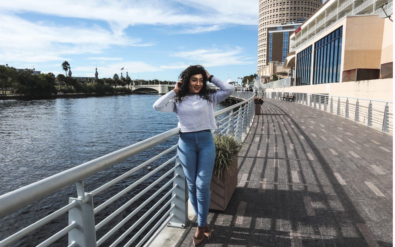 Martika styling the Britney pullover with denim and accessories