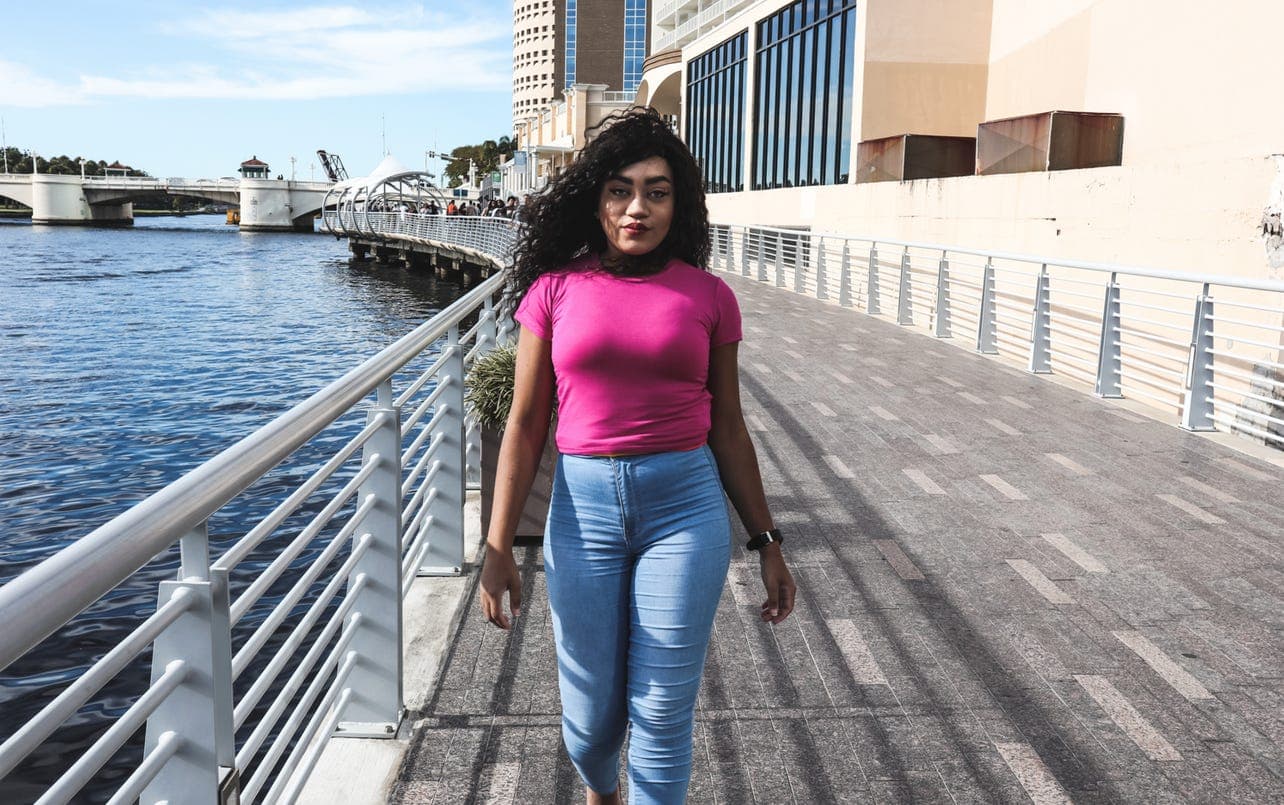 Rose violet baby tee styled with light-wash jeans
